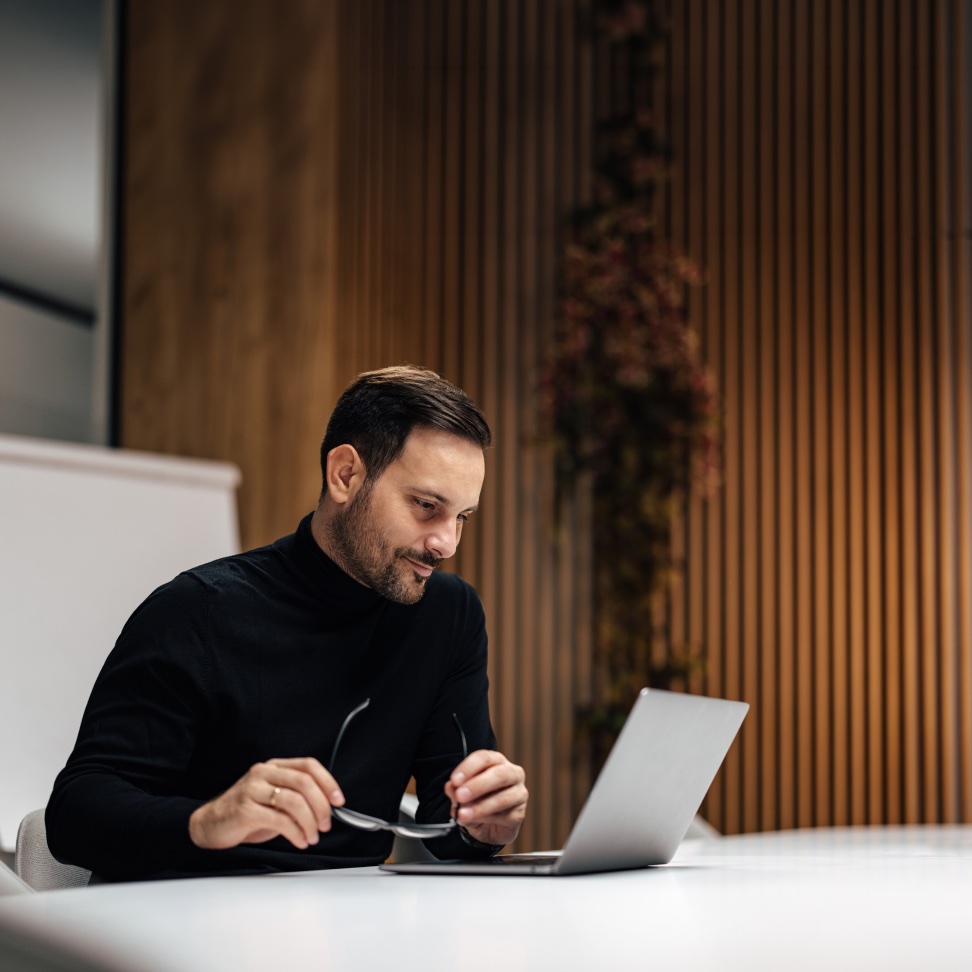 Investor reviewing a technical report